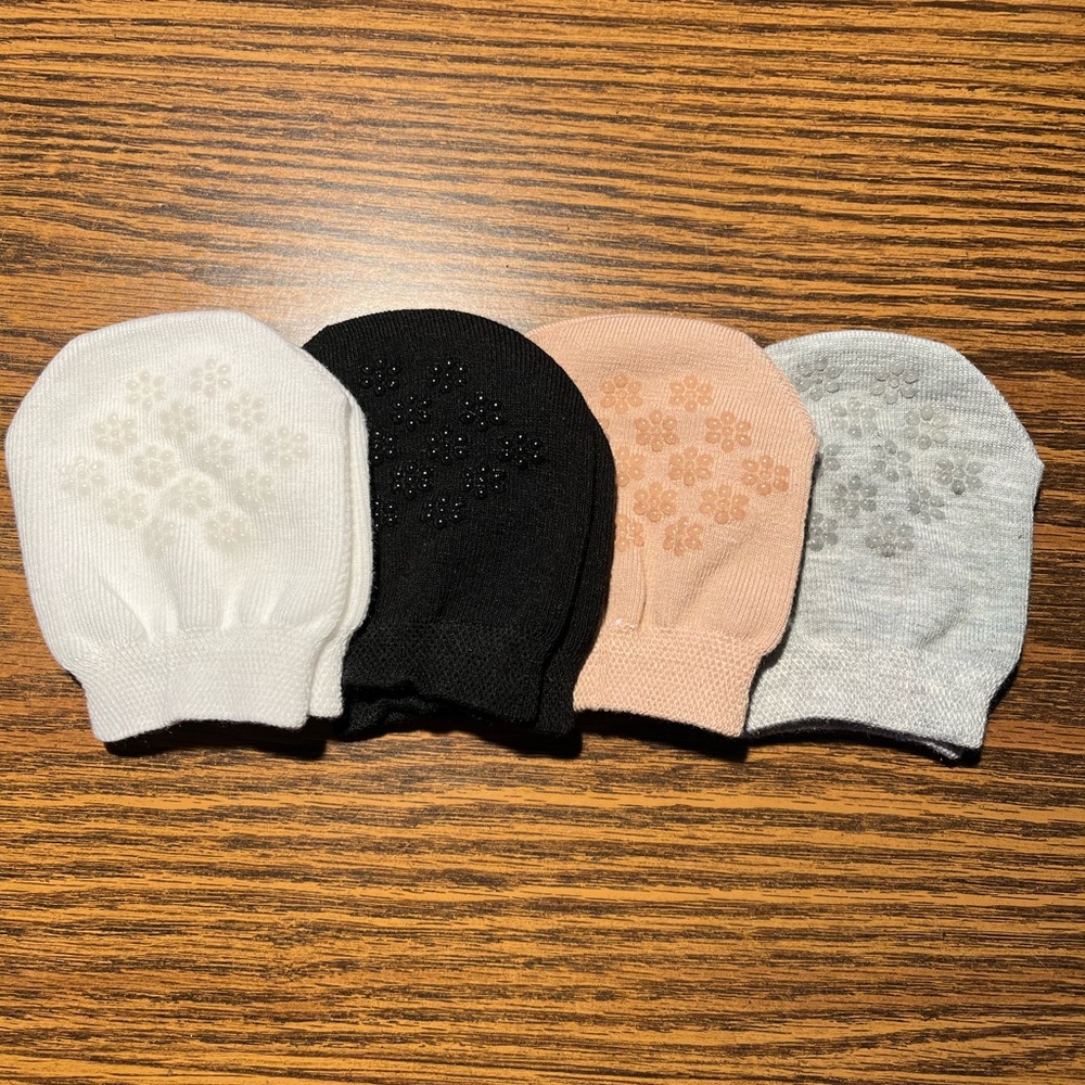 Set of Four Women’s Toe Caps in Assorted Colors